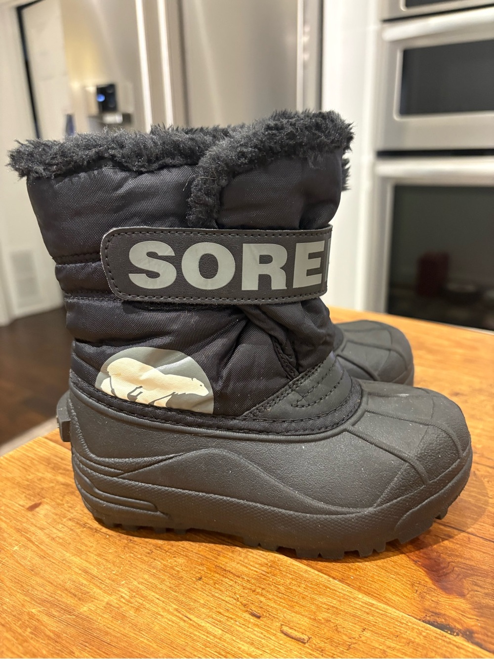 Sorel Kids Black Snow Boot with Faux Fur Cuff